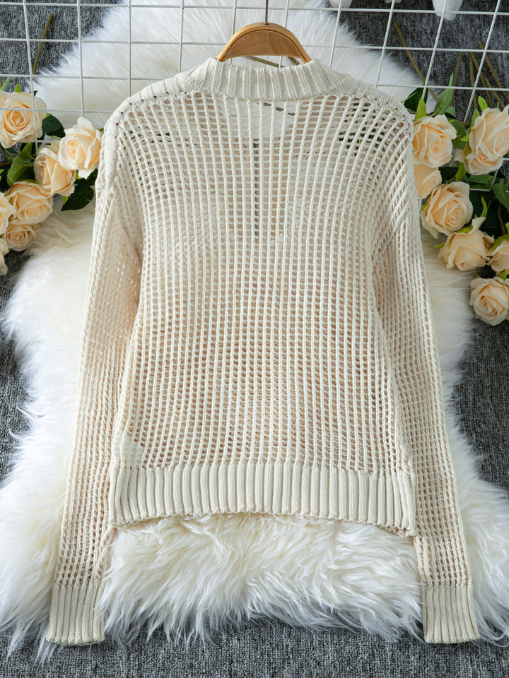 Half-zip hollow knitted sweater