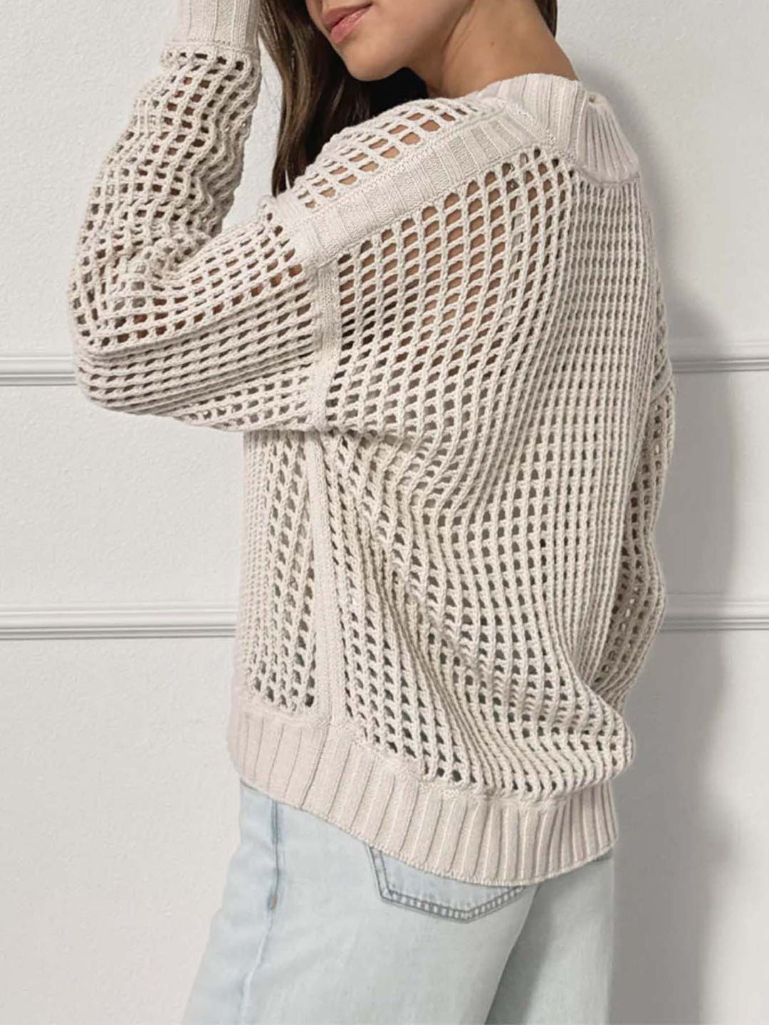 Half-zip hollow knitted sweater