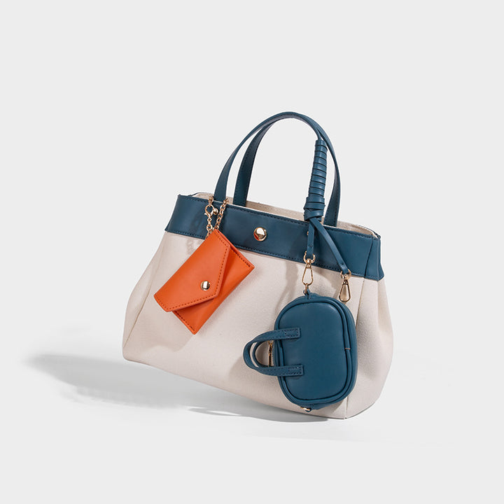 Large capacity simple hand-held commuting shoulder bag