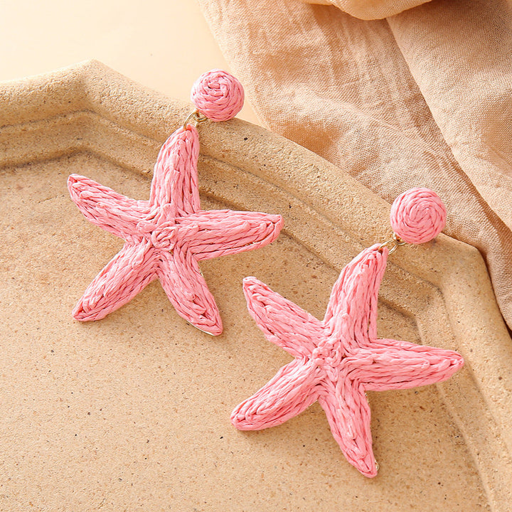 Boho hand-woven starfish earrings for seaside vacation