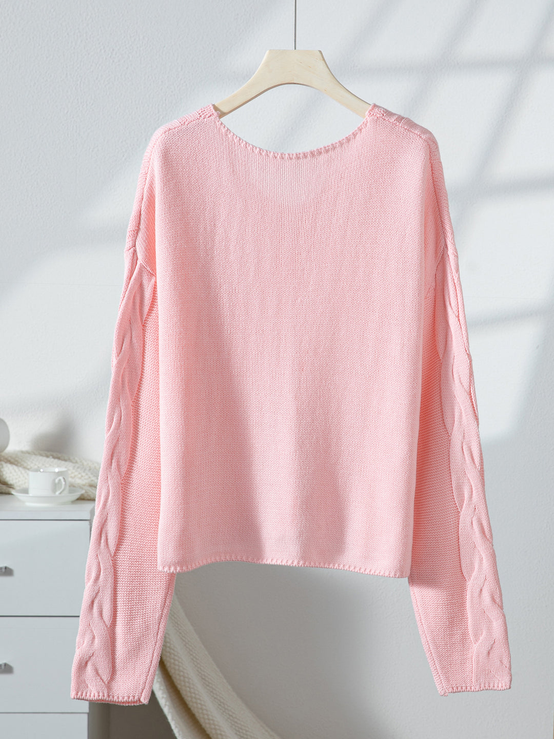 Pink loose V-neck cable knit pullover sweater