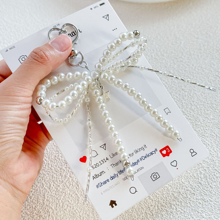 DIY handmade keychain with woven pearl bow tie