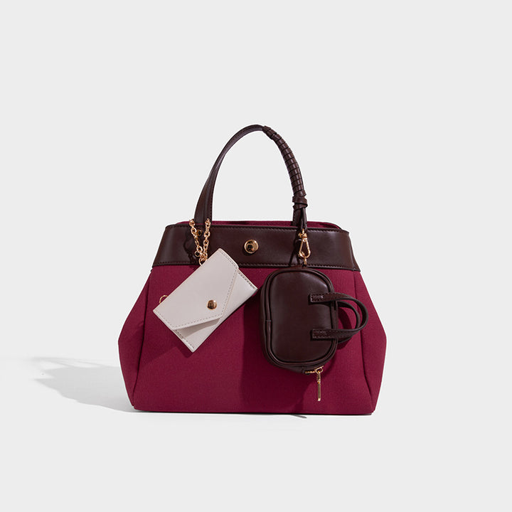 Large capacity simple hand-held commuting shoulder bag