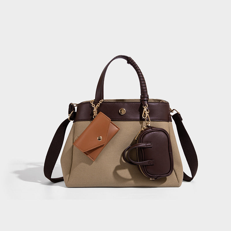 Large capacity simple hand-held commuting shoulder bag