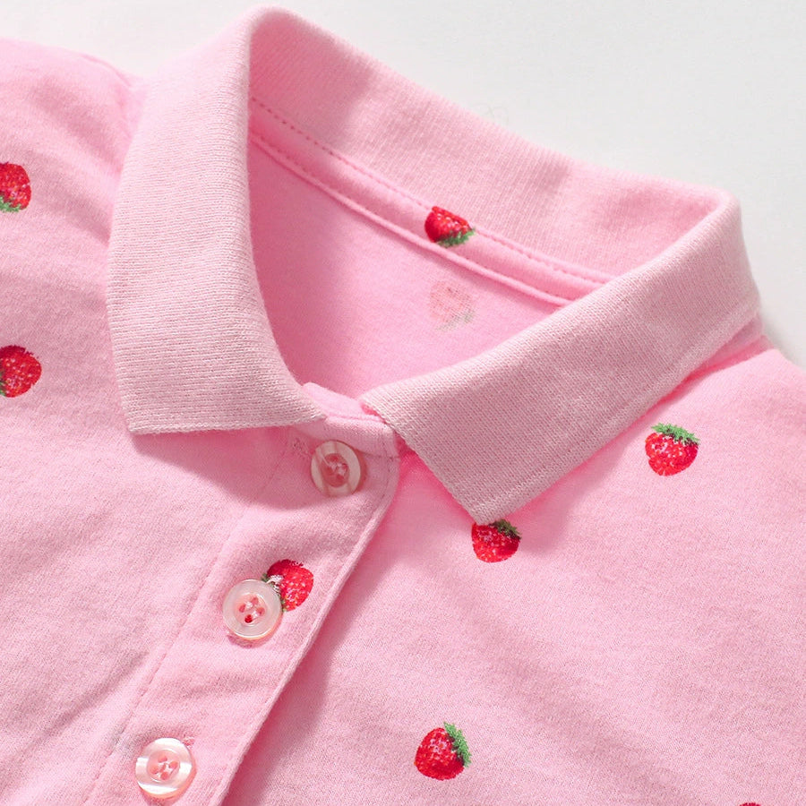 Girls pink cotton polo shirt with strawberry pattern