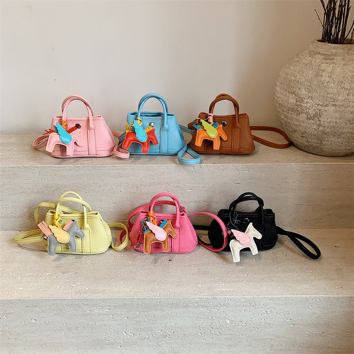 Lychee pattern mini crossbody bag with pony pendant