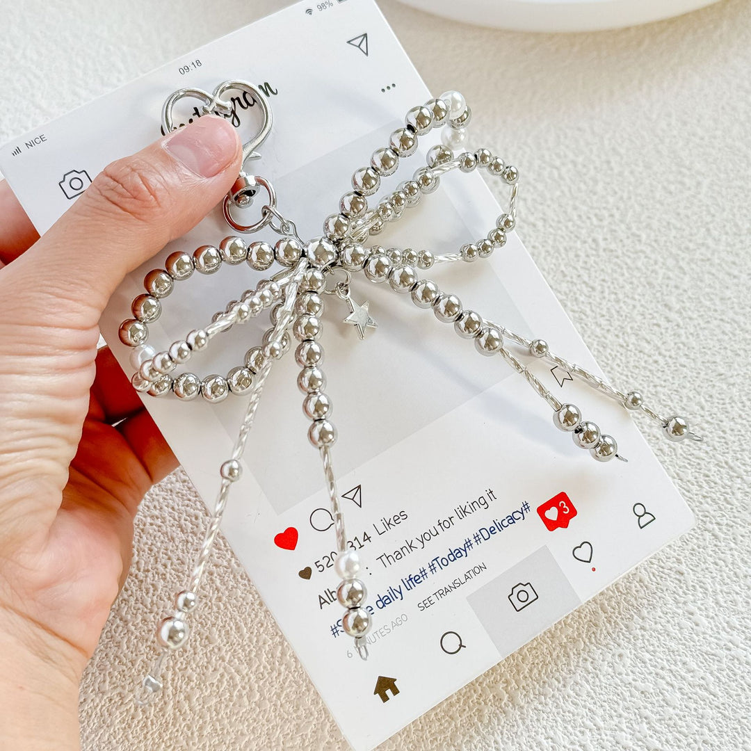 DIY handmade keychain with woven pearl bow tie