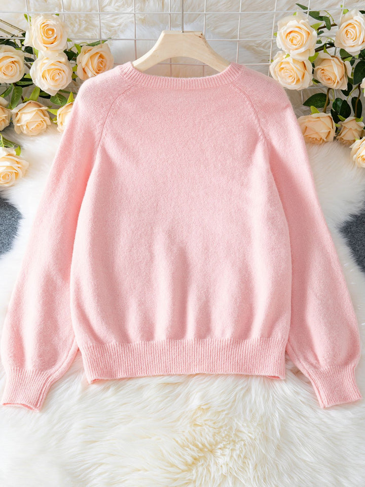 Pink raglan sleeve diamond button sweater for women