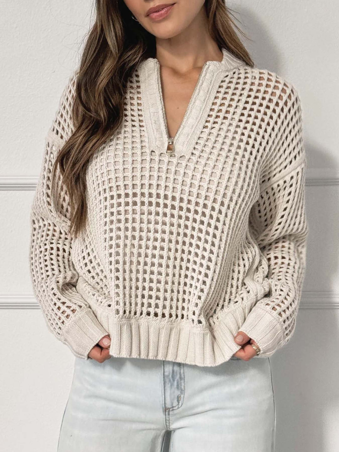 Half-zip hollow knitted sweater