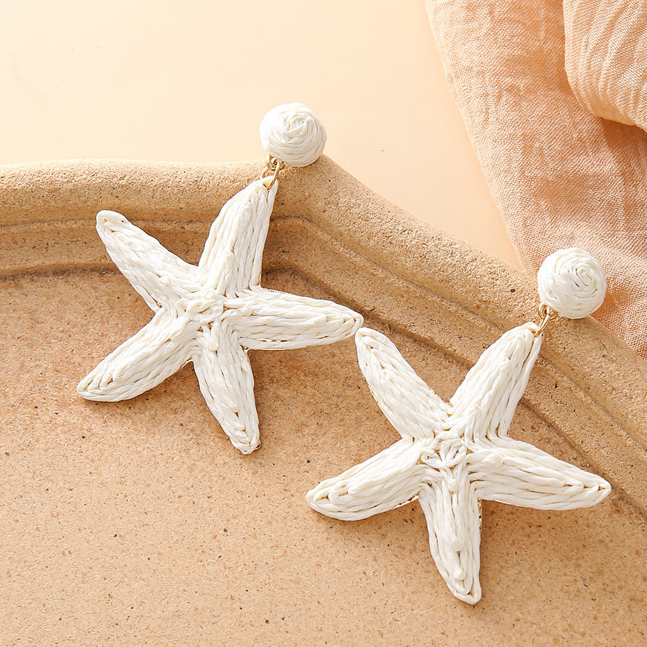 Boho hand-woven starfish earrings for seaside vacation