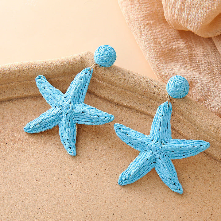 Boho hand-woven starfish earrings for seaside vacation