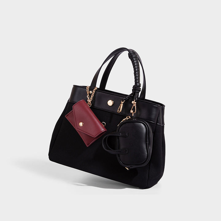 Large capacity simple hand-held commuting shoulder bag