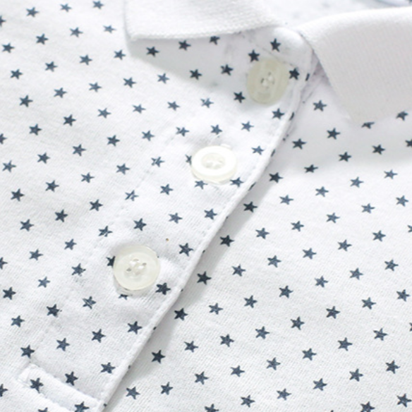 Girls pink cotton polo shirt with strawberry pattern