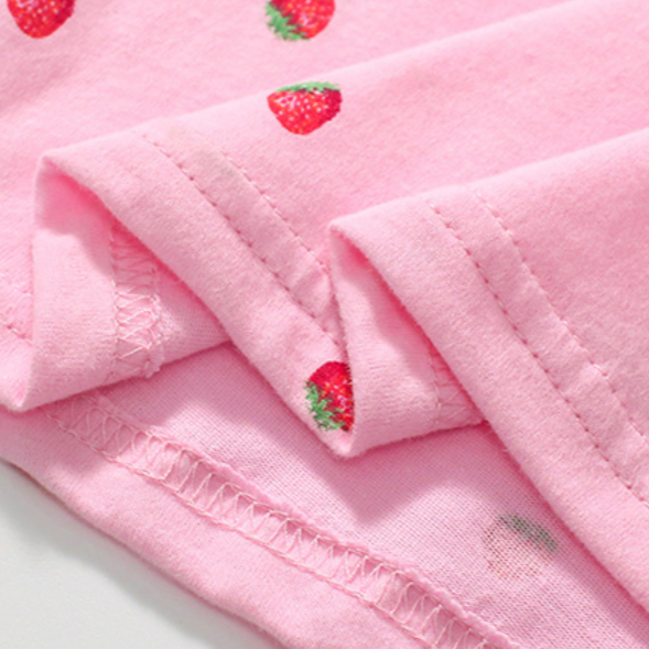 Girls pink cotton polo shirt with strawberry pattern